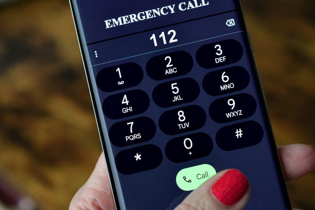 Dialing 112 Emergency services Call on mobile cell phone - police, fire department rescue EMT