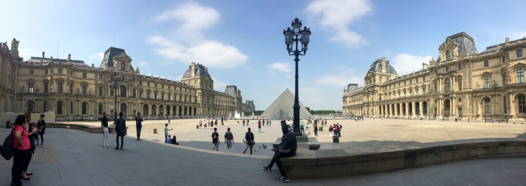 Panoramic view of Louvre Museum Paris France. The city of love & art while traveling the world