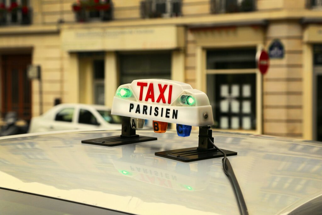 Sign of Parisian taxi
